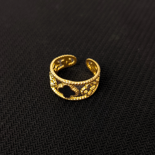 gold toned designer ring with black stone accent gold toned designer ring with black stone accent