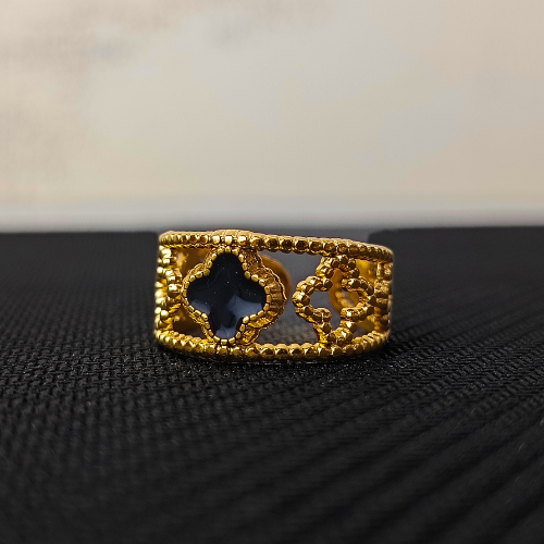 gold toned designer ring with black stone accent gold toned designer ring with black stone accent